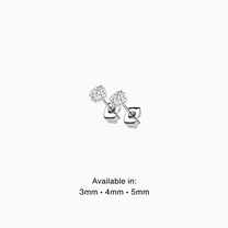 Pair of titanium prong set round CZ stud earrings with butterfly backs, available in 3mm, 4mm, and 5mm